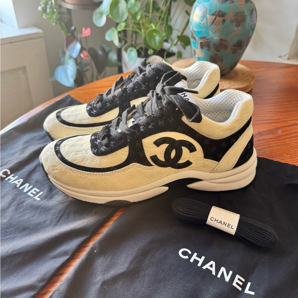CHANEL cream/black suede CC low top sneaker